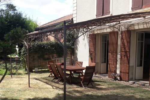 Pergola fer forgé cintrée grande profondeur 5m à Aurainville