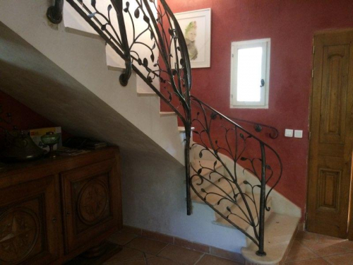 rampe escalier en fer forgé sur mesure à rognes